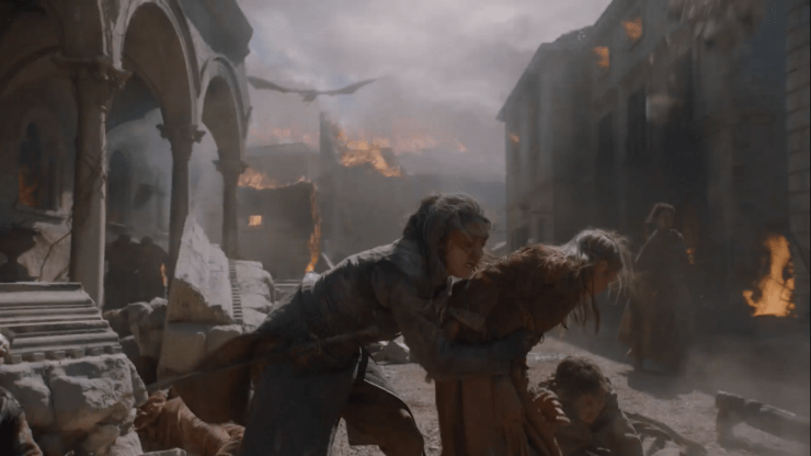 Arya con el dragón de fondo